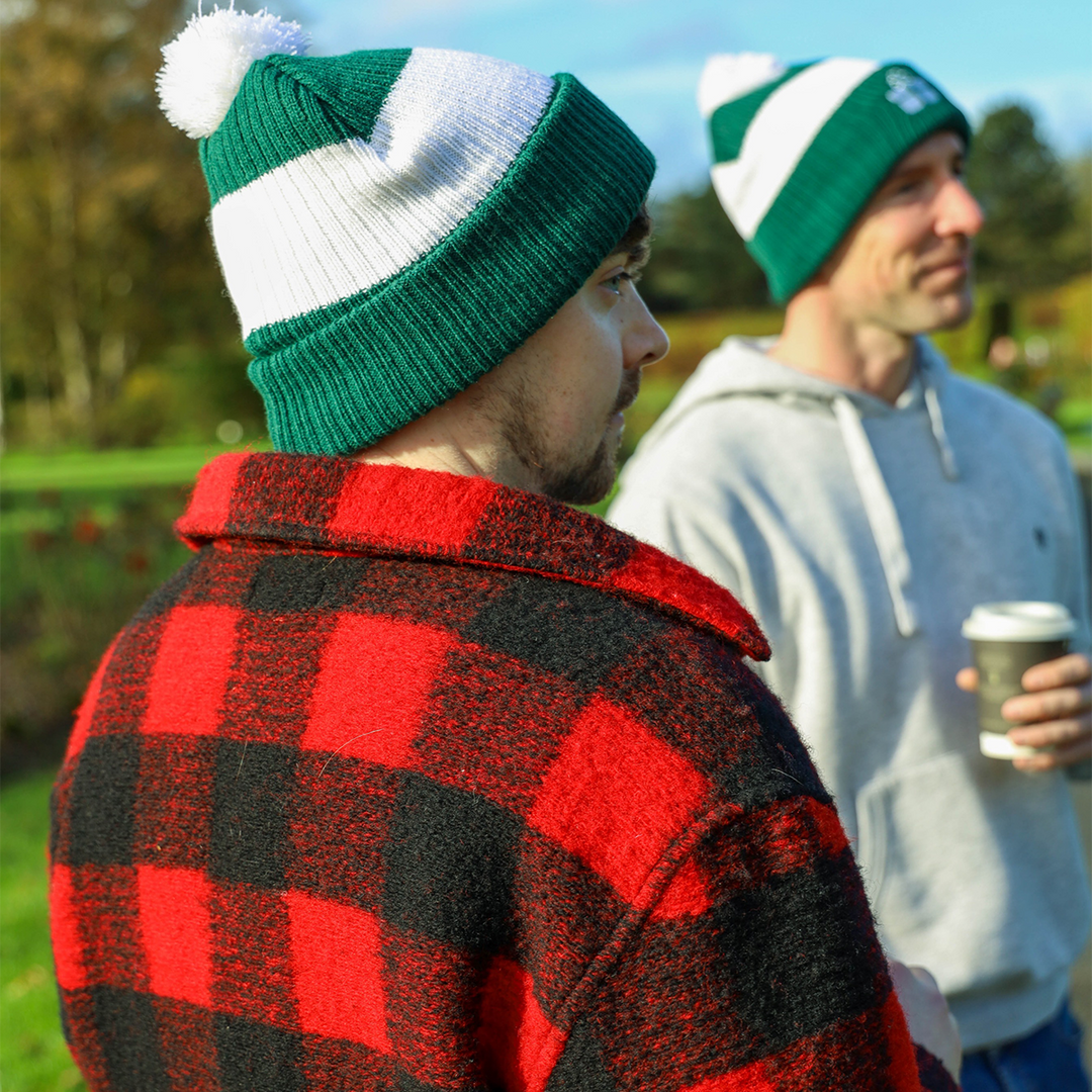 Sports beanie on sale hats with pom